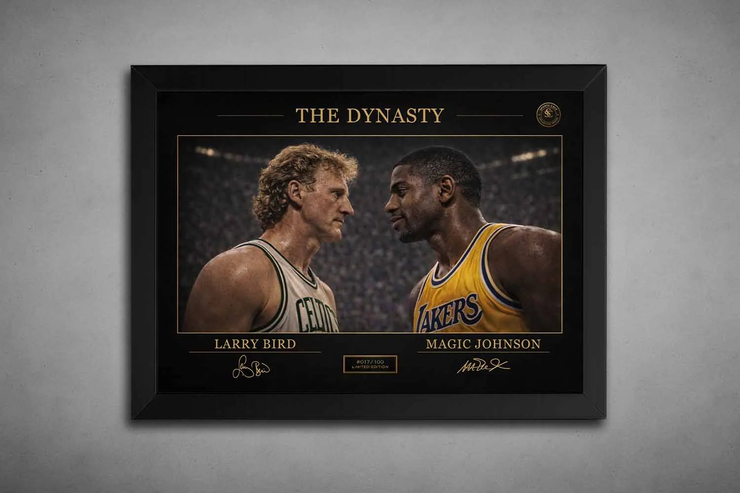 Black frame NBA rivalry poster of Larry Bird and Magic Johnson face-off, premium framed sports art with gold detailing