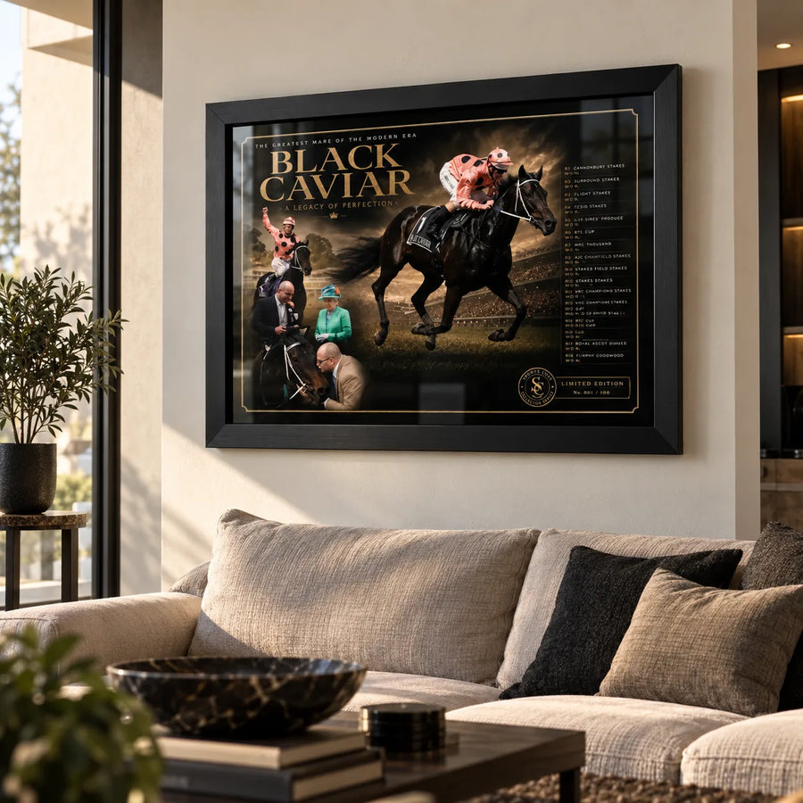 Black Caviar horse racing wall art displayed above a neutral sofa in a bright contemporary living room with a black frame.