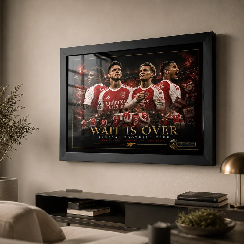 Framed Arsenal football wall art in living room