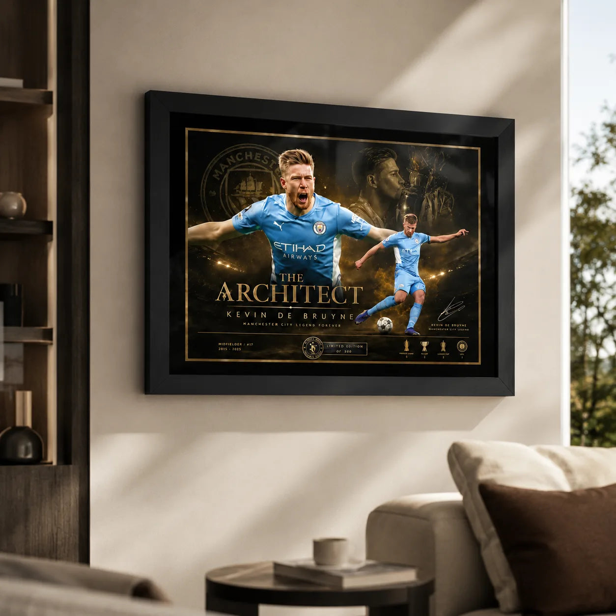 Kevin De Bruyne Manchester City soccer wall art in a black frame on a bright living room wall.