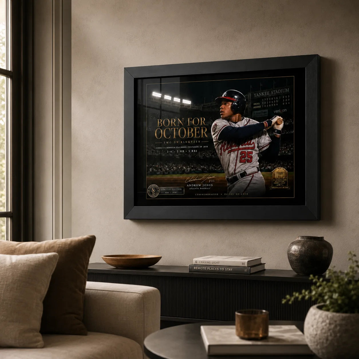 Born for October Andruw Jones wall art displayed in a warm living room above a low cabinet in a black frame.