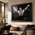 Brad Fittler wall art displayed in a contemporary living room, with the black framed Roosters Legacy tribute above a sofa.