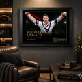Brad Fittler wall art displayed in a dark man cave, with the black framed Roosters Legacy tribute above a leather chair.