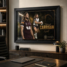 Patrick Carrigan Brisbane Broncos wall art in a modern office, displayed in a black frame above a timber credenza