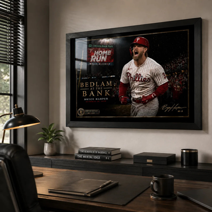 Bryce Harper wall art displayed in a modern office above a timber desk with a premium black frame.