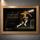 Oak framed Caitlin Foord soccer wall art featuring her in Australia colours against a stadium backdrop.