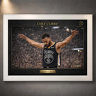 Chef Curry basketball wall art in a white frame, shown front-on against a dark textured wall.