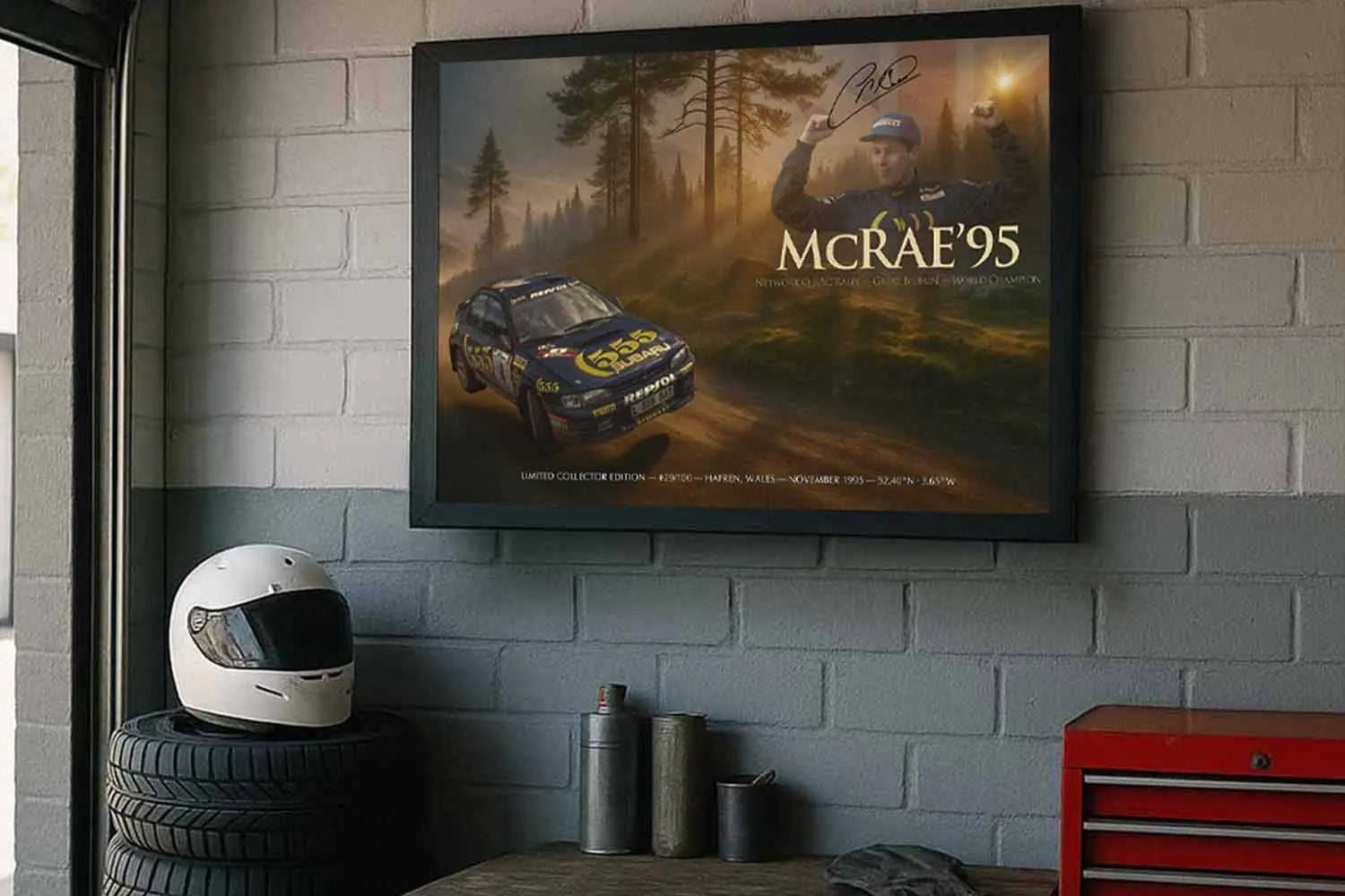 Colin McRae 1995 black framed motorsport sports wall art displayed in a garage workshop.