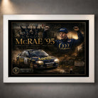 Colin McRae 95 motorsport wall art in a white frame, featuring the RAC Rally tribute artwork on a grey wall.