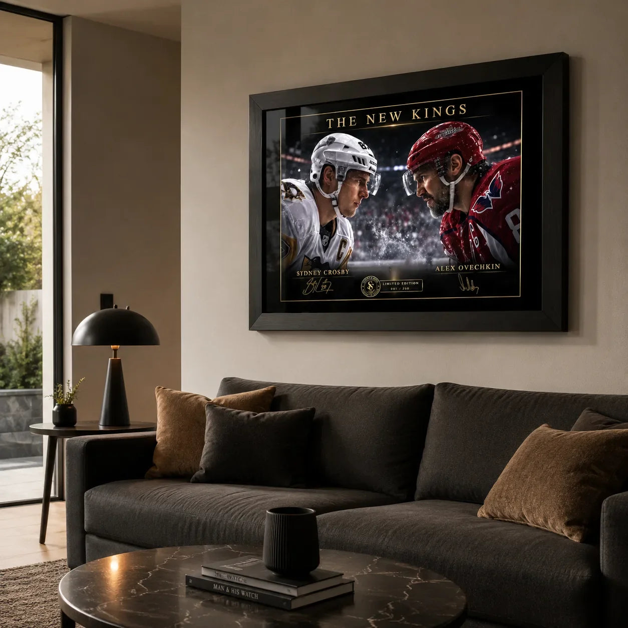 Black-framed Sidney Crosby and Alex Ovechkin hockey wall art displayed above a dark sofa in a modern living room.