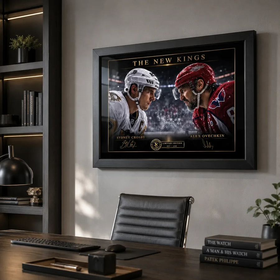 Black-framed Sidney Crosby and Alex Ovechkin hockey artwork displayed above a desk in a modern executive office.