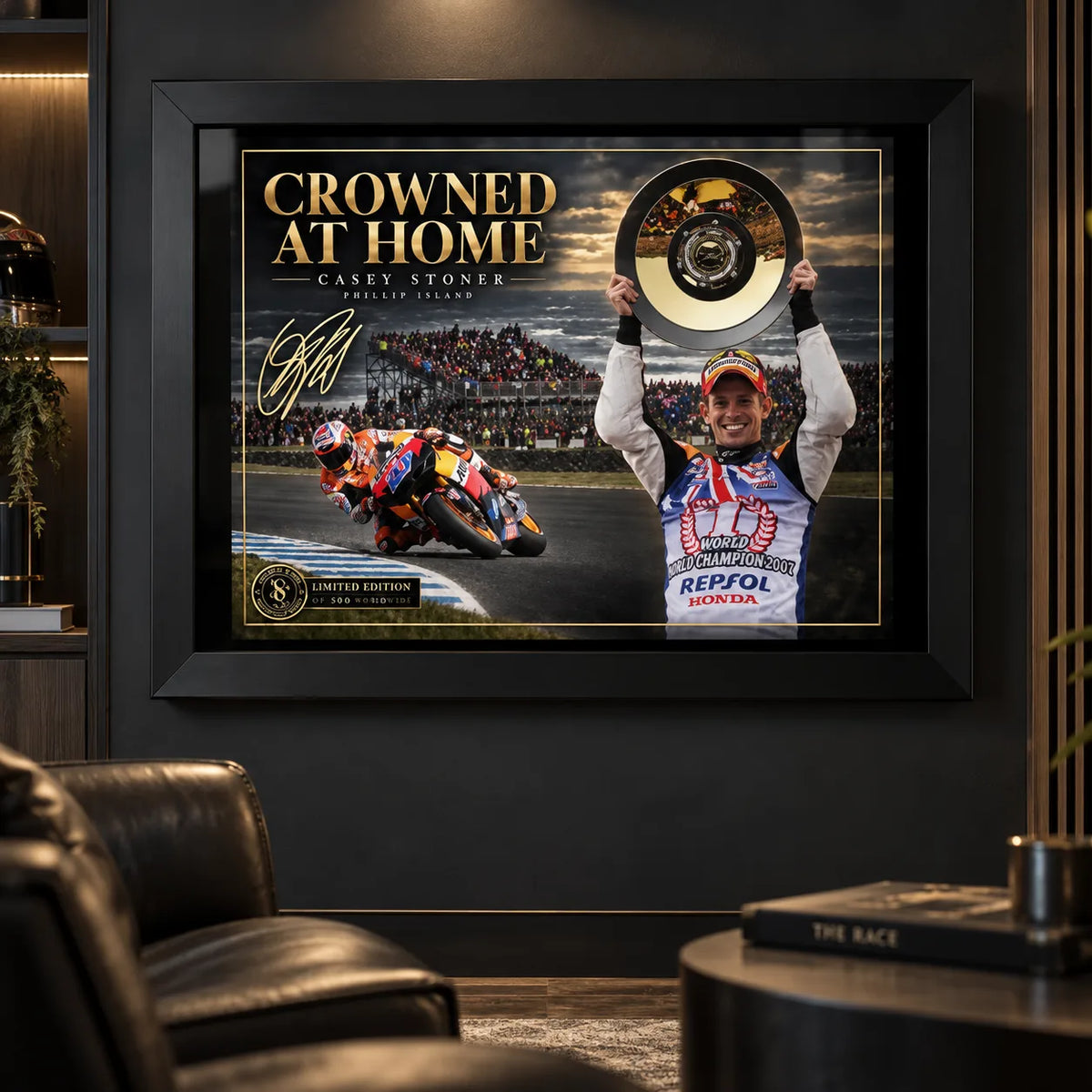 Casey Stoner wall art displayed in a dark motorsport man cave with the black framed Crowned at Home design.