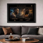 Curry vs LeBron framed piece displayed above a modern sofa, refined man cave wall décor with warm tones and collector appeal.