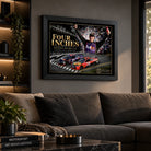 Denny Hamlin Daytona 500 racing artwork displayed above a charcoal sofa in a contemporary living room.