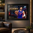Cade Cunningham wall art displayed in a dark man cave setting with a black frame.