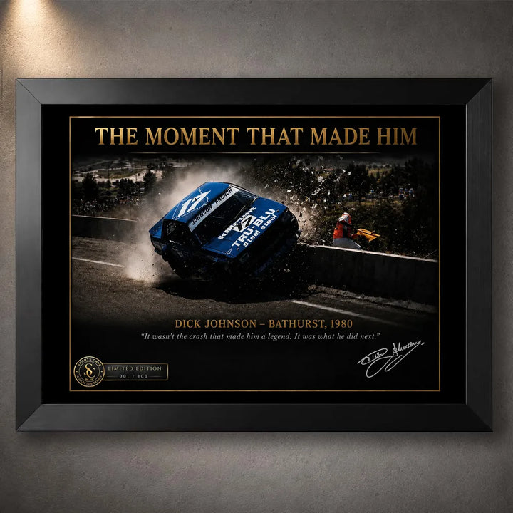 Black framed Dick Johnson Bathurst 1980 motorsport wall art showing the crash tribute against a dark textured wall.