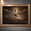 Diego Maradona The God soccer wall art in an oak frame, showing the Argentina 1986 artwork.