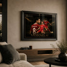 Dominik Szoboszlai Liverpool FC soccer wall art in a black frame displayed in a modern living room.