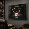 Black framed basketball wall art displayed in a premium man cave with shelving and dark textured wall.
