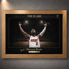 Oak framed basketball wall art with gold typography and dramatic arena lighting.