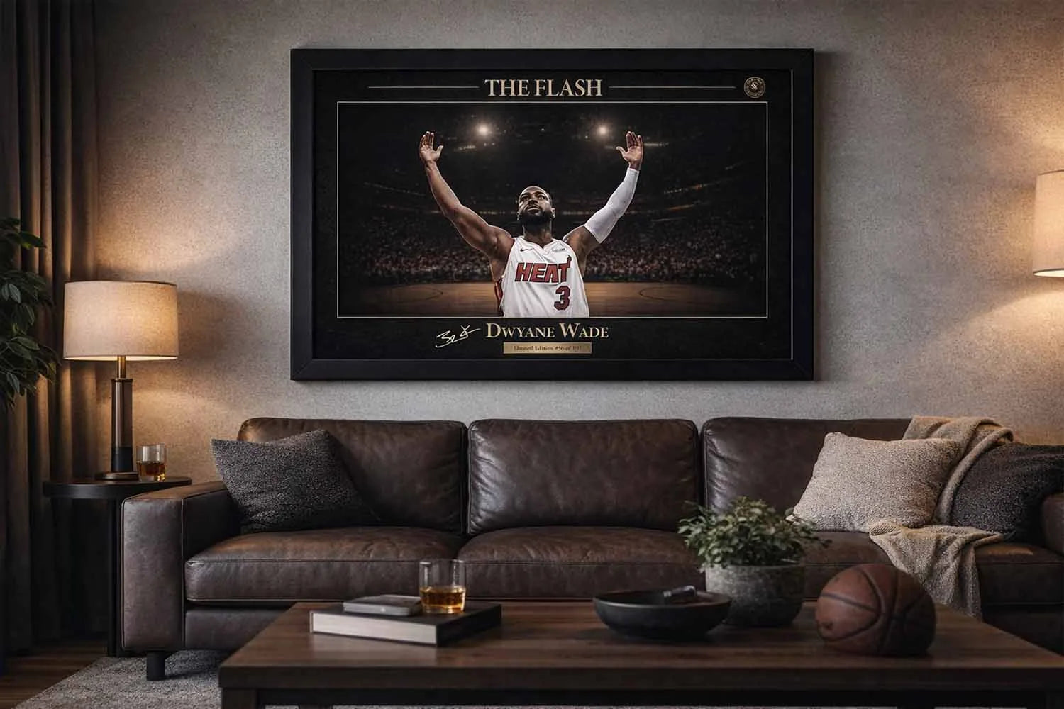 Dwyane Wade black framed sports wall art styled above leather sofa in modern man cave setting.