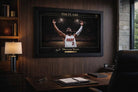 Framed Dwyane Wade NBA sports wall art displayed in refined home office with warm lighting.