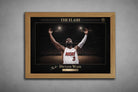 Oak-framed Dwyane Wade NBA wall art featuring “The Flash” design with gold accents and stadium lighting.