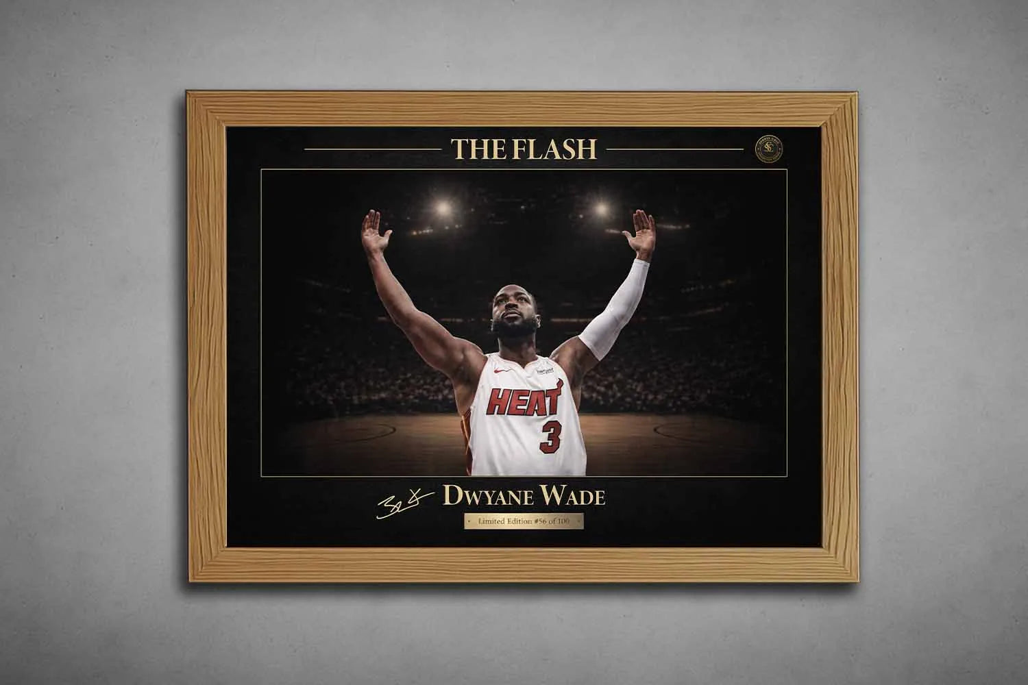 Oak-framed Dwyane Wade NBA wall art featuring “The Flash” design with gold accents and stadium lighting.