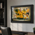 Ellie Carpenter Matildas soccer wall art displayed in a modern office above a timber desk in a black frame.
