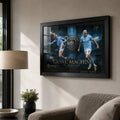 Erling Haaland Manchester City wall art in a black frame displayed on a warm modern living room wall.