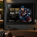 Nathan MacKinnon wall art in a dark man cave setting, black framed above a timber console with warm display lighting.