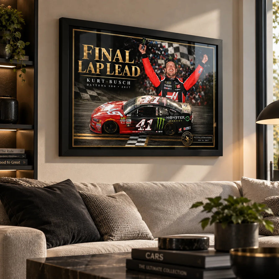 Kurt Busch Final Lap Lead wall art displayed in a bright living room above a neutral sofa in a black frame.