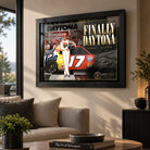 Darrell Waltrip NASCAR wall art displayed in a warm modern living room above a neutral sofa and timber coffee table.