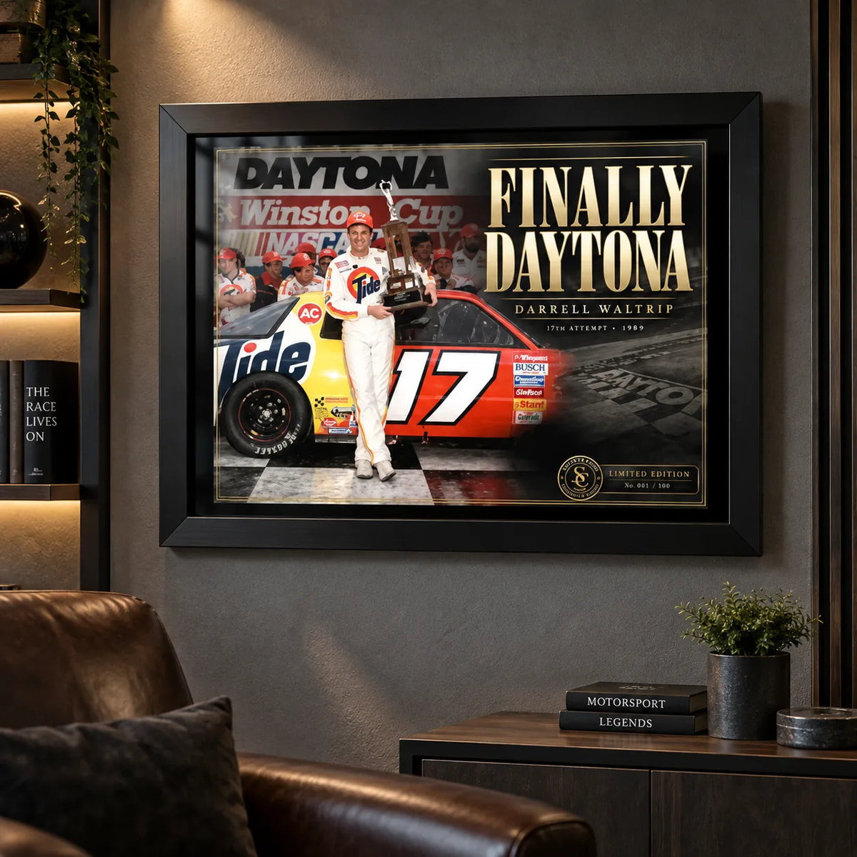 Darrell Waltrip NASCAR wall art displayed in a dark motorsport man cave with leather seating and collector styling.