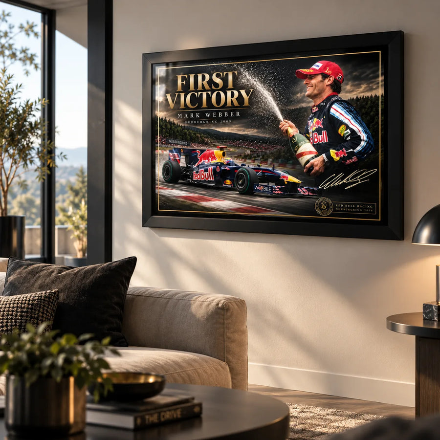 Mark Webber First Victory wall art displayed above a sofa in a bright contemporary living room with natural light.