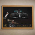 Oak framed poster of a Formula 1 car and a driver Lewis Hamilton, celebrating with a trophy, featuring 'Seven Crowns'.
