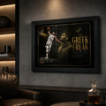 Giannis Antetokounmpo framed NBA wall art shown in a dark man cave lounge with shelves and leather chair.