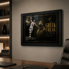 Giannis Antetokounmpo Greek Freak wall art in a black frame displayed on a modern office wall.