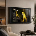 Glen Maxwell cricket wall art in a black frame displayed in a refined modern living room with warm neutral styling.