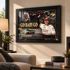 Dale and Ned Jarrett Go Baby Go NASCAR wall art displayed in a bright living room with a black frame.