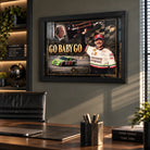 Dale and Ned Jarrett Go Baby Go NASCAR wall art displayed in a modern office with warm natural light.