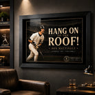 Don Mattingly wall art displayed in a dark man cave setting with the black frame and collector artwork clearly featured.