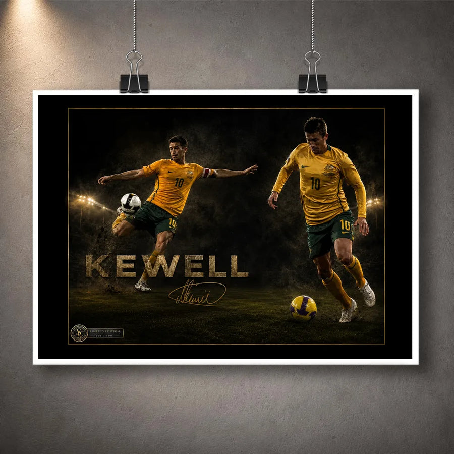 Unframed Harry Kewell soccer wall art print with a white border and hanging clips against a grey wall.