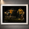 White framed Harry Kewell soccer wall art featuring two action poses in Australia colours on a dark stadium scene.