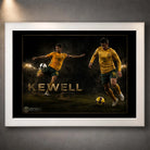 White framed Harry Kewell soccer wall art featuring two action poses in Australia colours on a dark stadium scene.