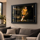 Hayley Raso Matildas framed soccer wall art displayed above a neutral sofa in a warm, modern living room.