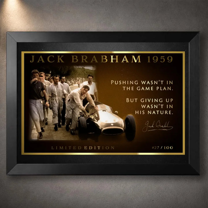 Jack Brabham 1959 motor racing wall art in a black frame, showing his car-pushing moment as a collector print.