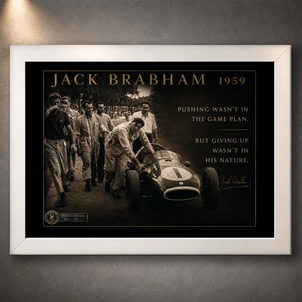 Jack Brabham 1959 motorsport wall art in a white frame, featuring the historic car-pushing scene and collector details.