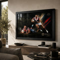 James Tedesco Sydney Roosters rugby league wall art in a black frame above a timber console in a warm modern living room.