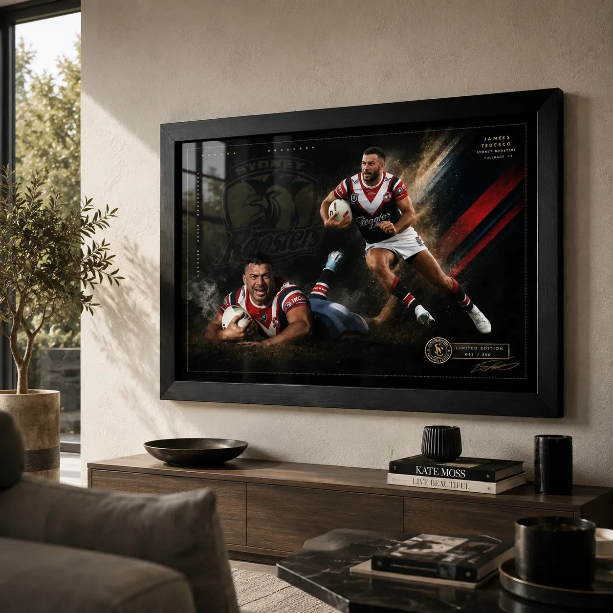 James Tedesco Sydney Roosters rugby league wall art in a black frame above a timber console in a warm modern living room.
